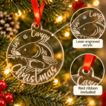 A Carpy Christmas bauble showing laser engraved acrylic design and red ribbon