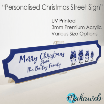 A UV printed Personalised Christmas Blue Gonks family name sign