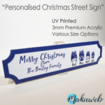 A UV printed Personalised Christmas Blue Gonks family name sign