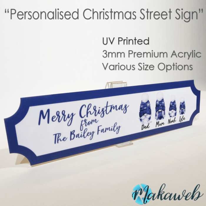 A UV printed Personalised Christmas Blue Gonks family name sign